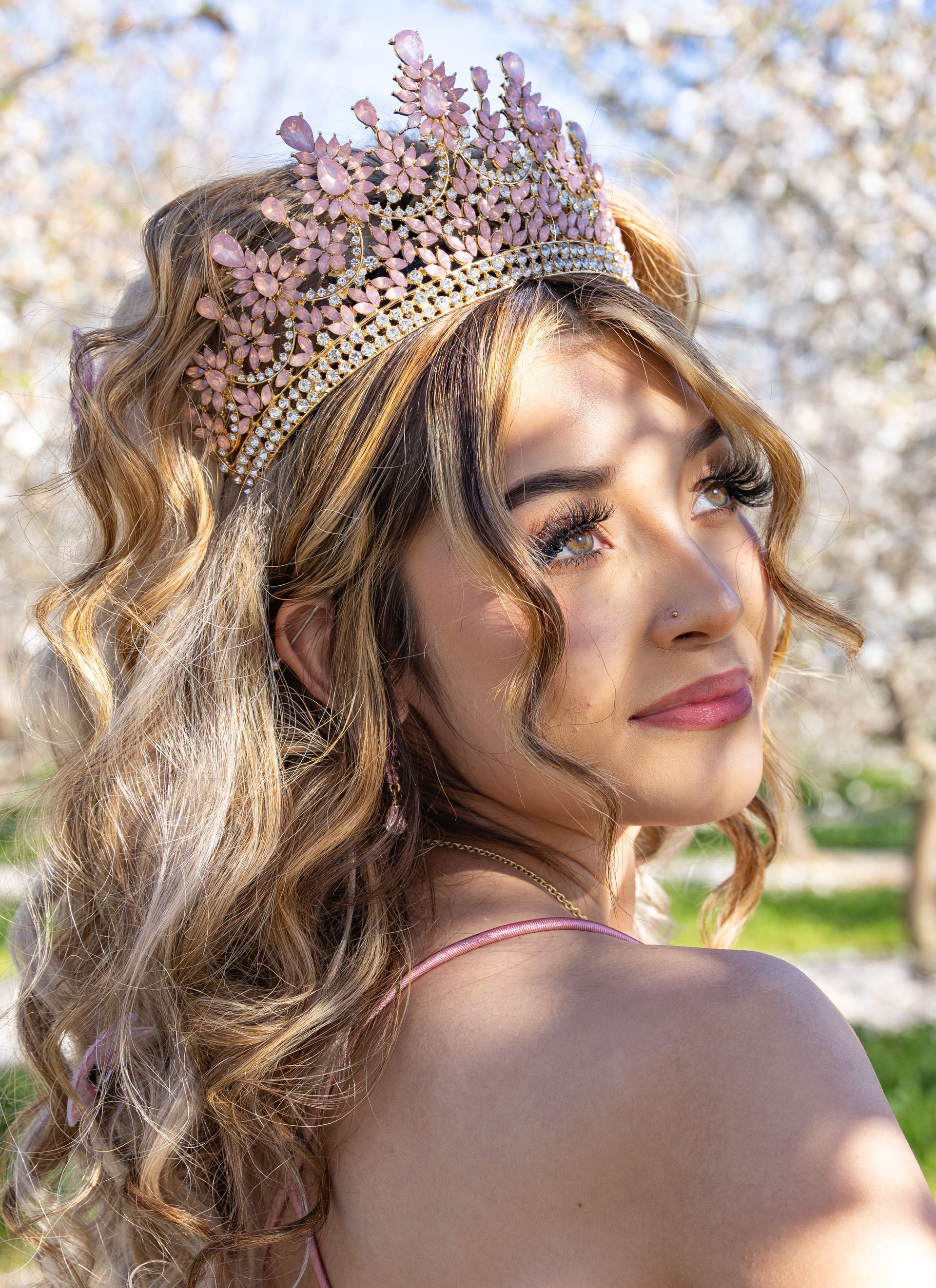 girl smiling while riding horse