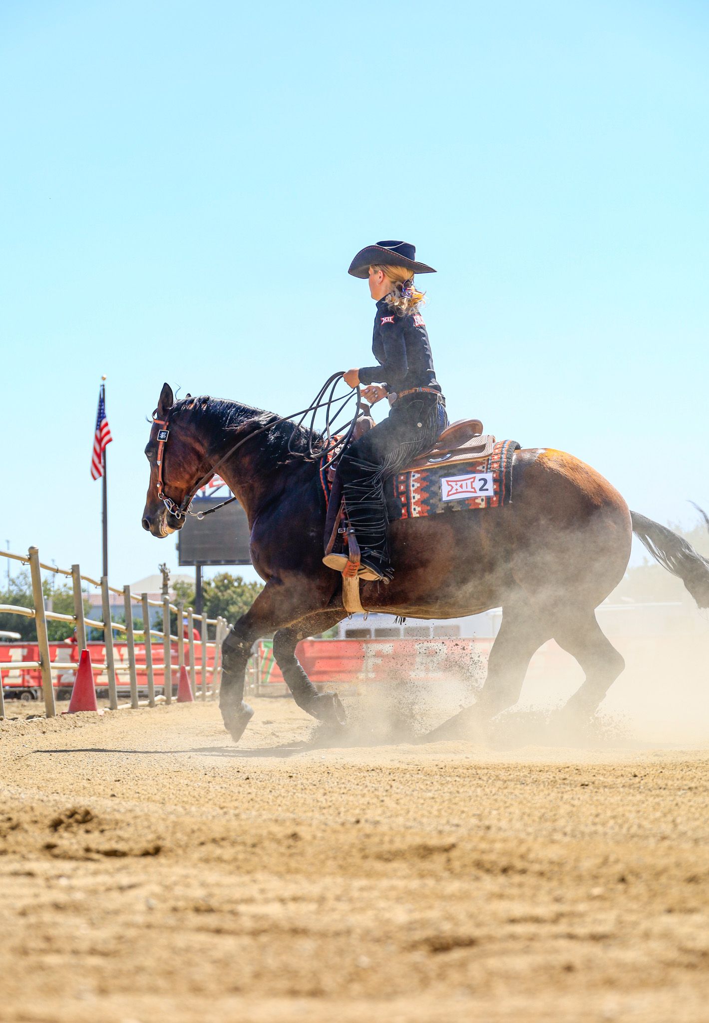 horse turning near American flag