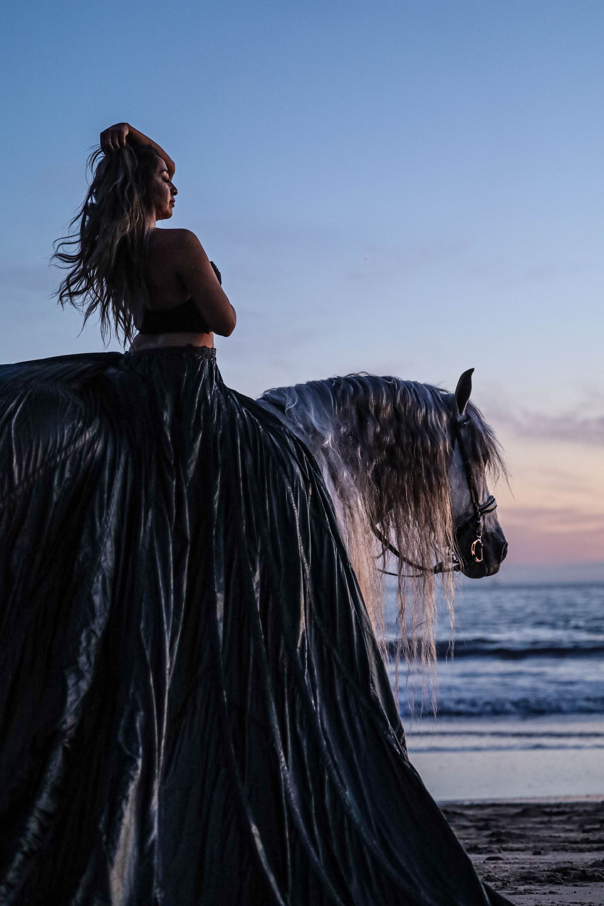 girl and horse on beach 