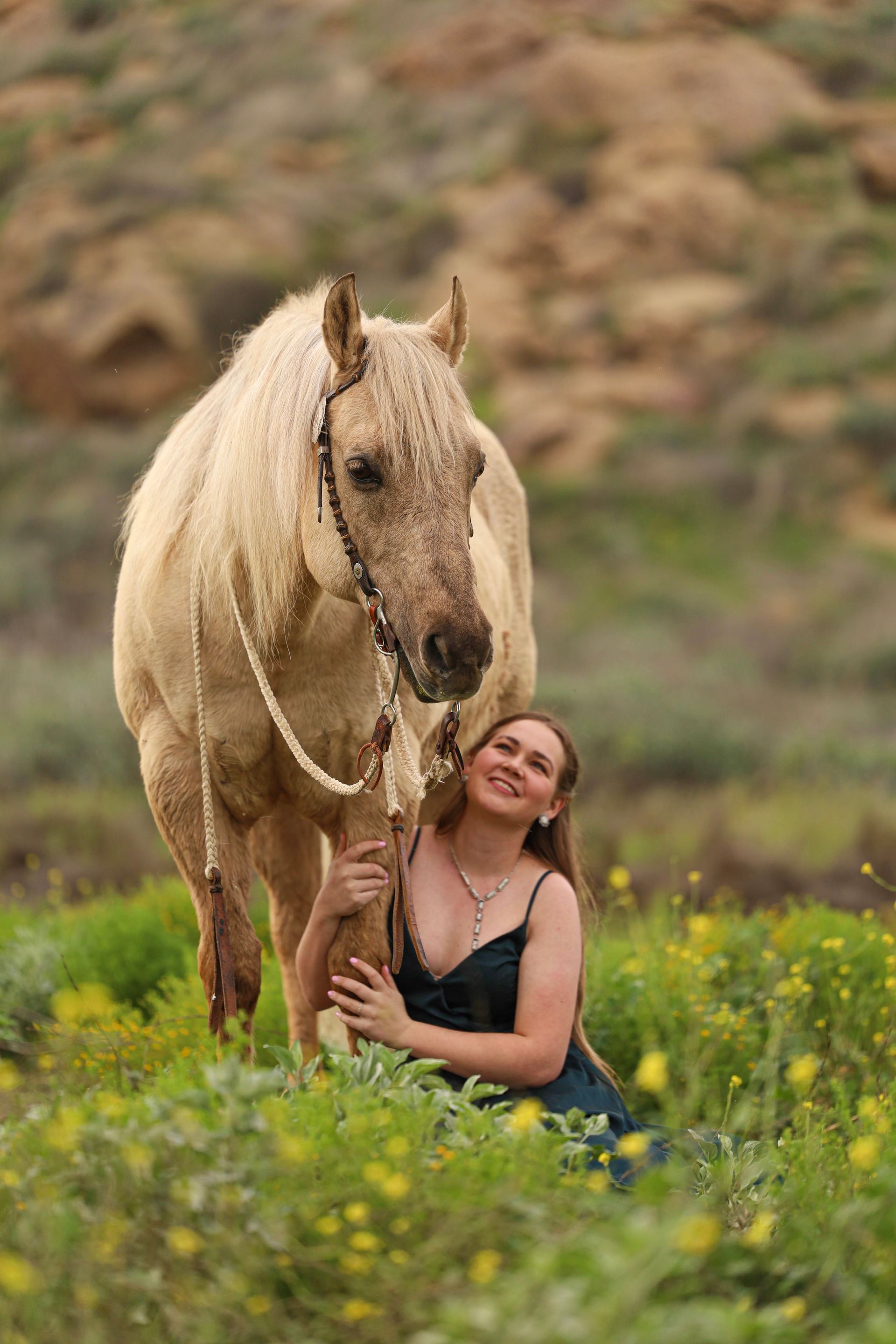 girl smiling at horse 