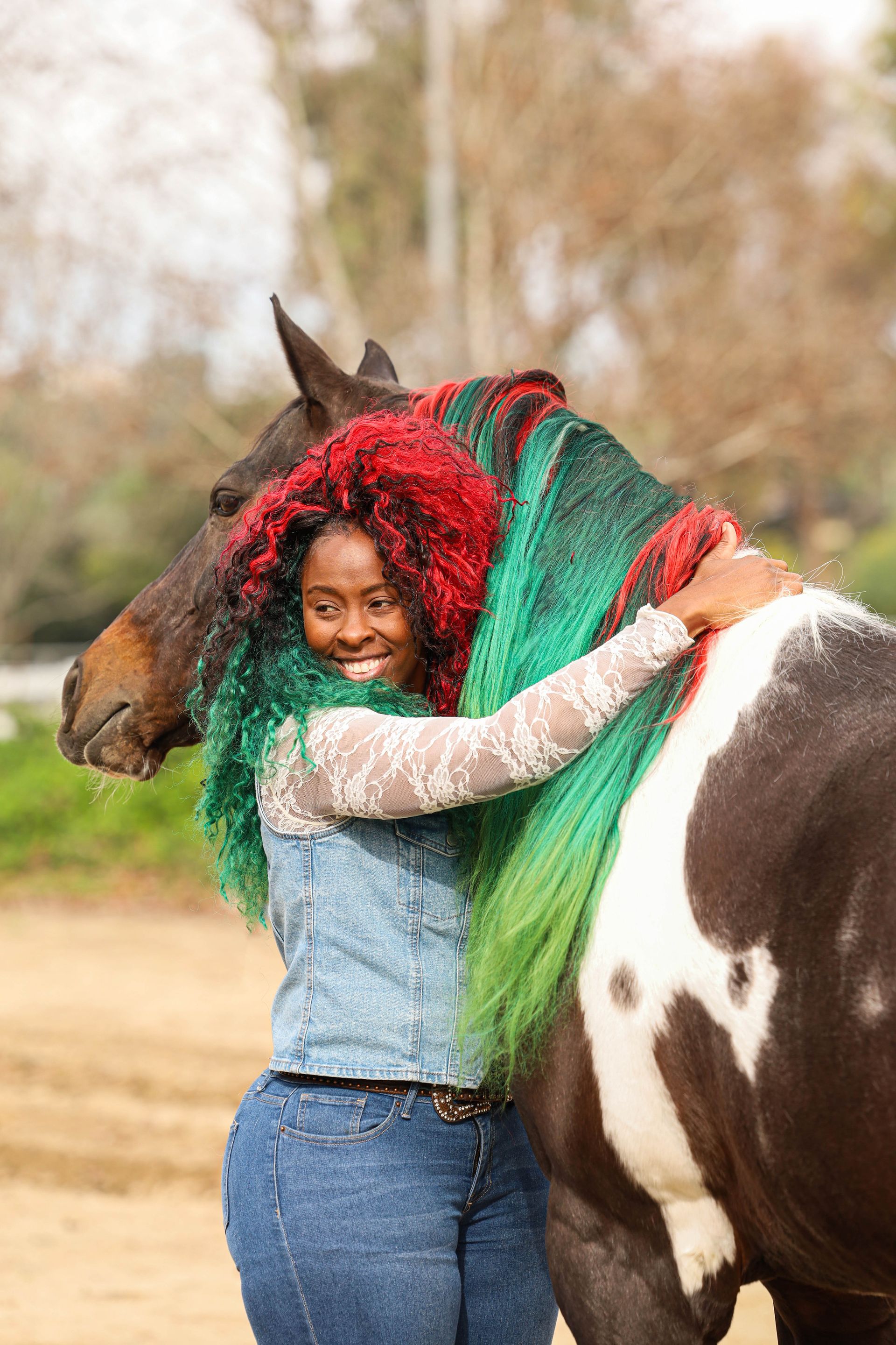 girl smiling with horse 
