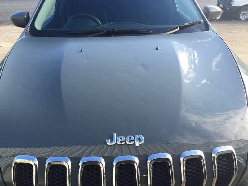 front view of a gray car(after) — Dent Magic in Coffs Harbour, NSW
