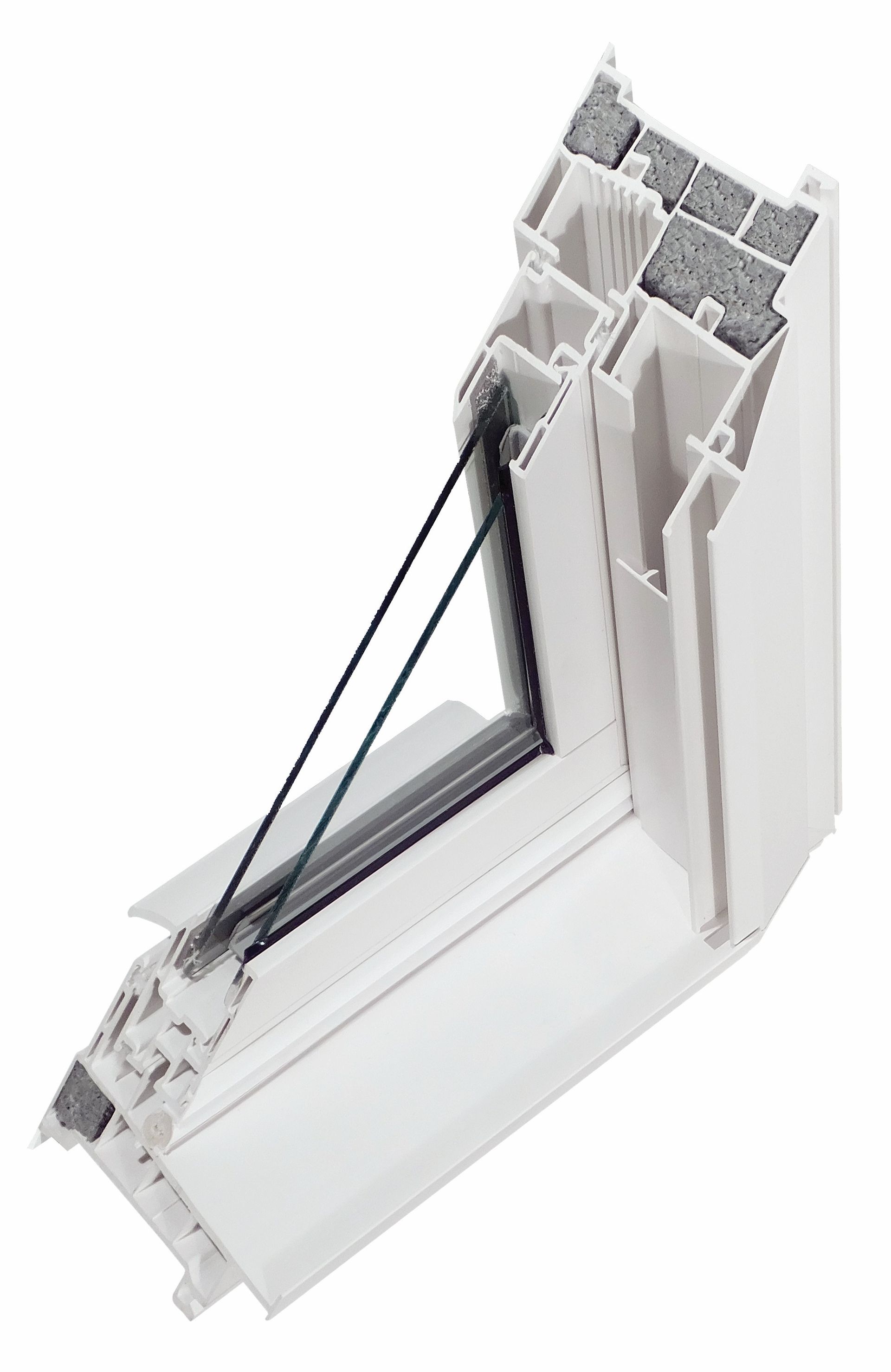 Living room with fireplace, stone surround, TV, sofa with colorful pillows, armchair, and large windows.