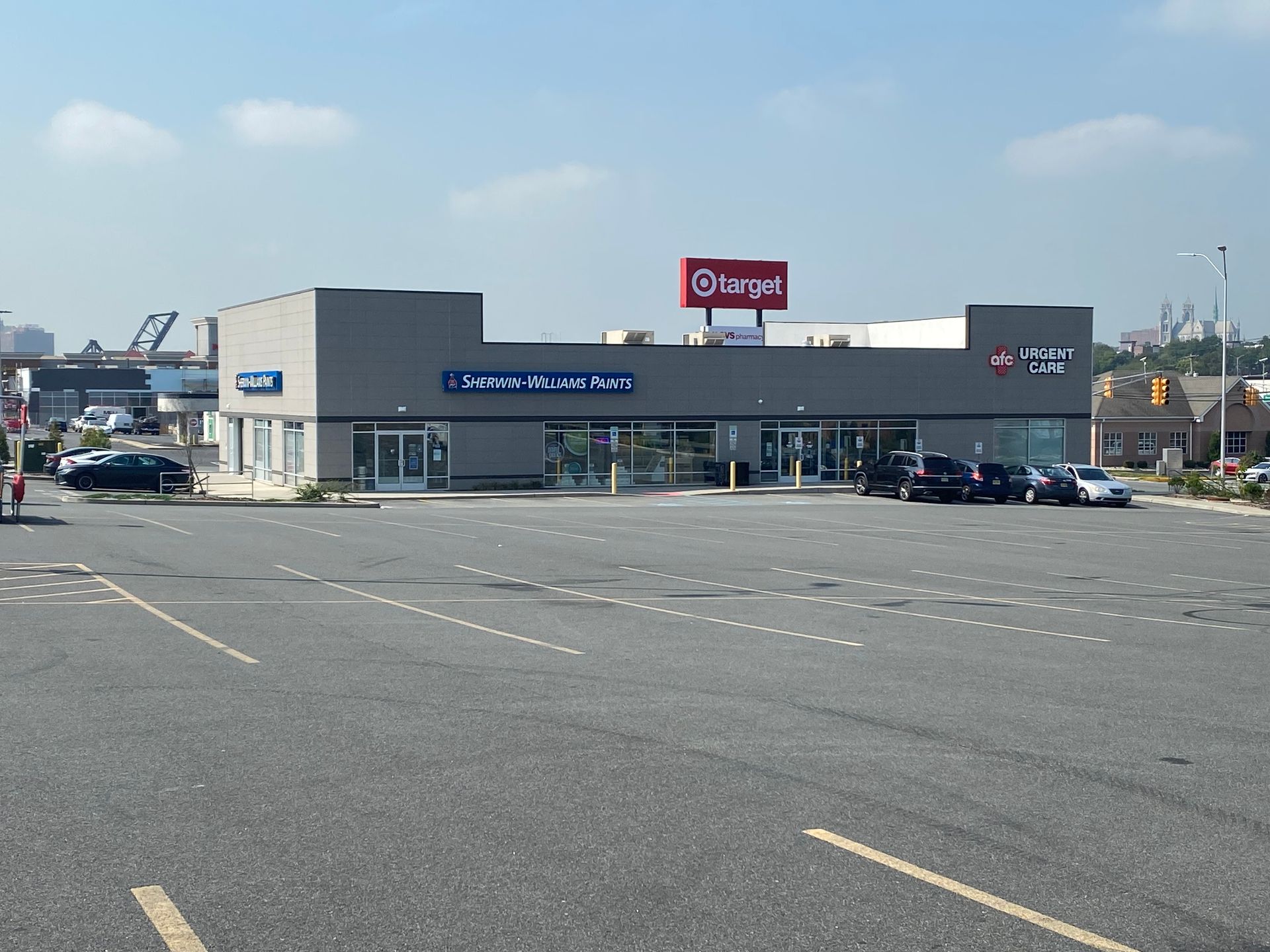 A parking lot with a target store in the background