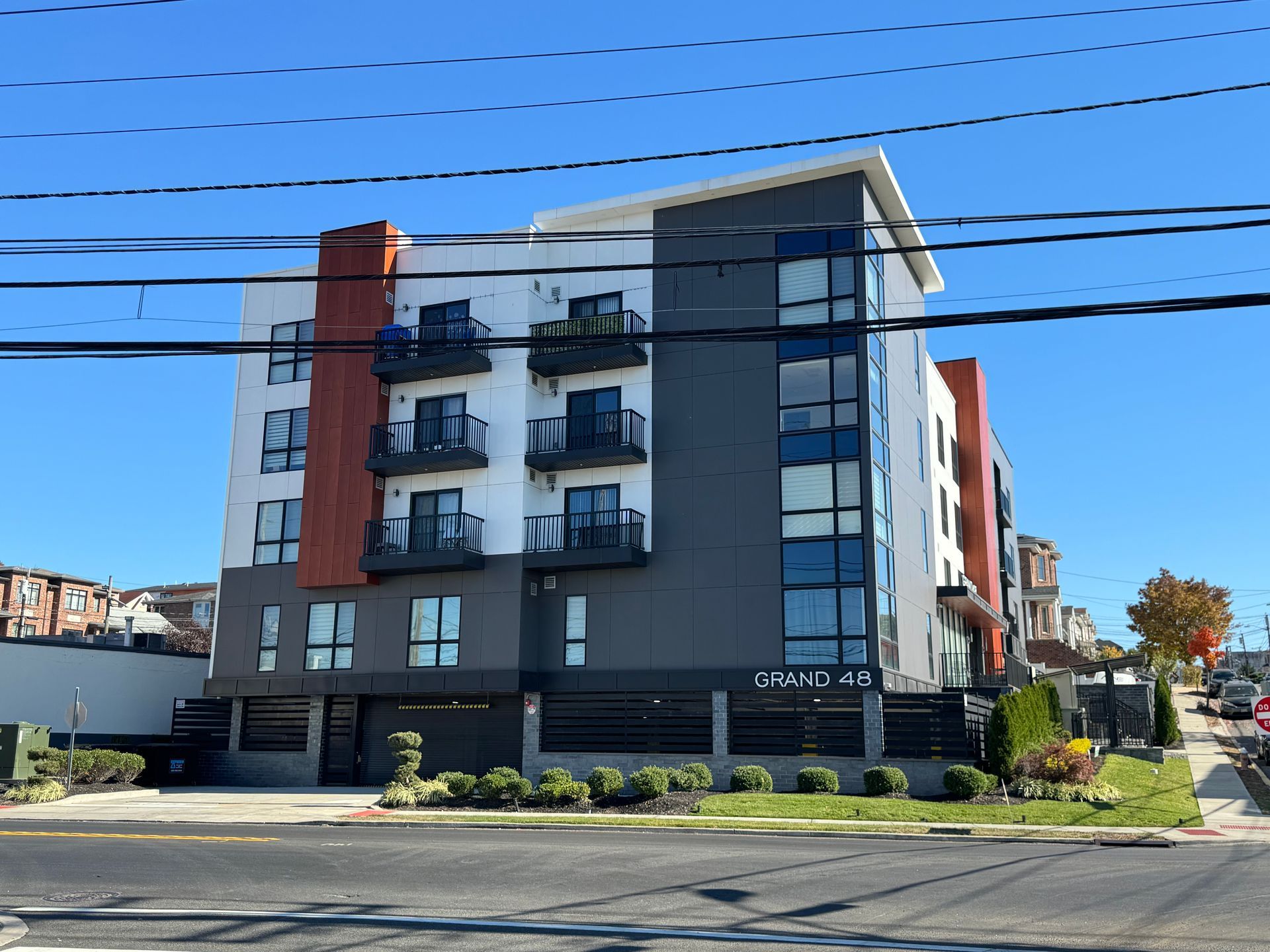 A large apartment building with a lot of windows and balconies