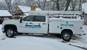 White service truck from Stewart's Plumbing.