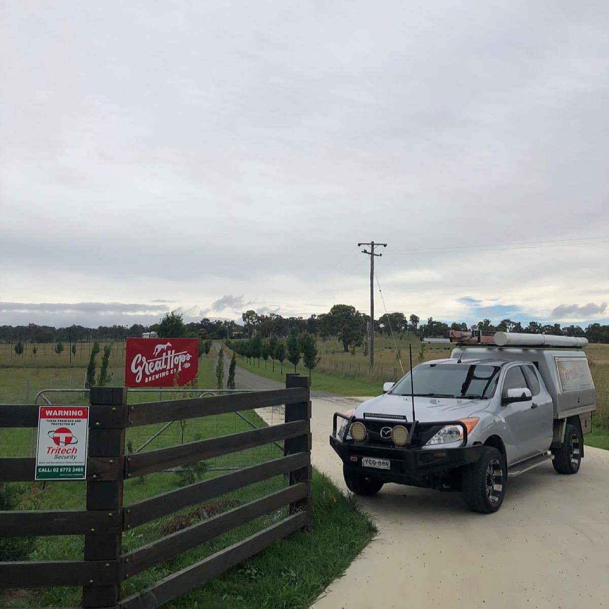 Van near wood fence— Security Systems in Armidale, NSW