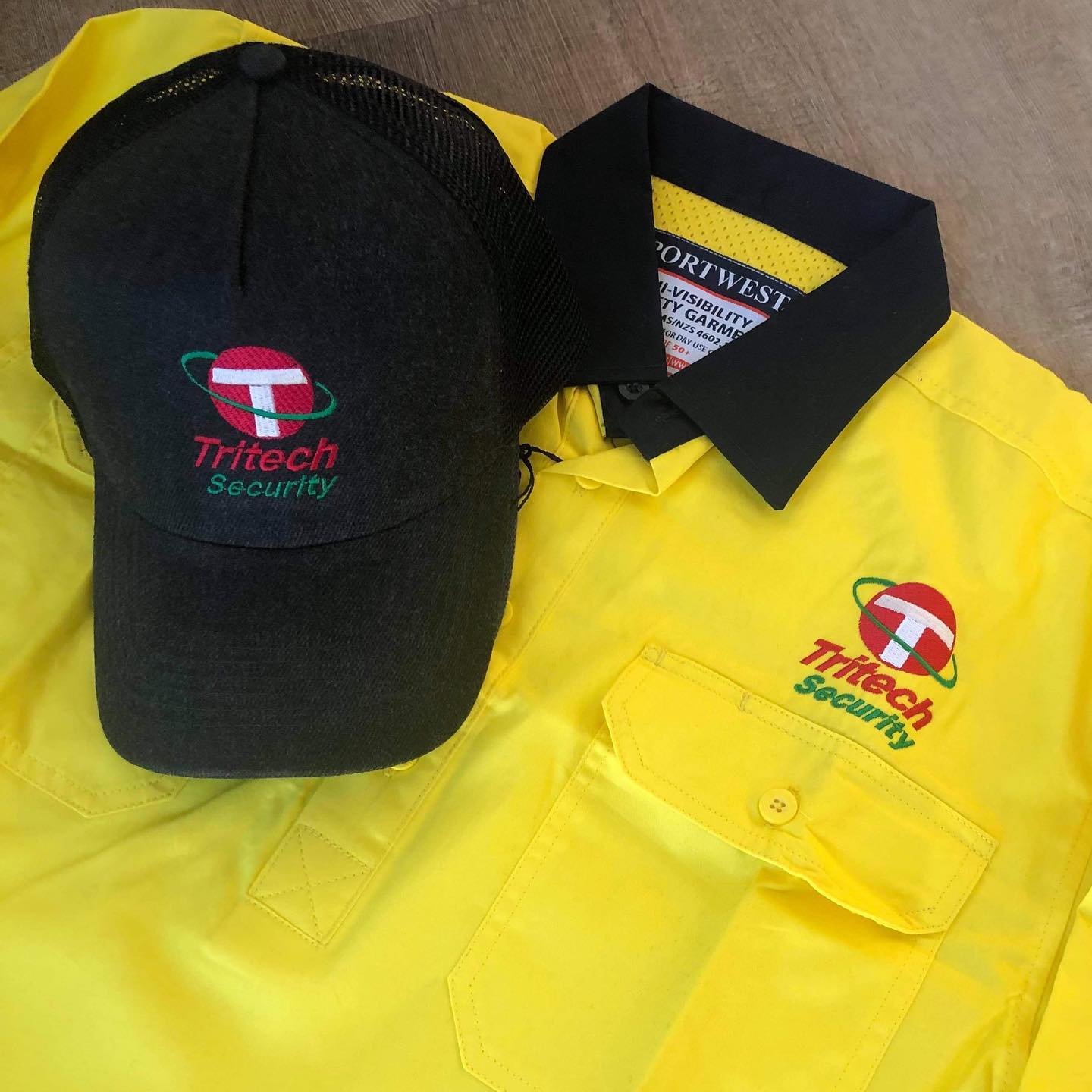 Cap and polo shirt of security worker — Security Systems in Armidale, NSW