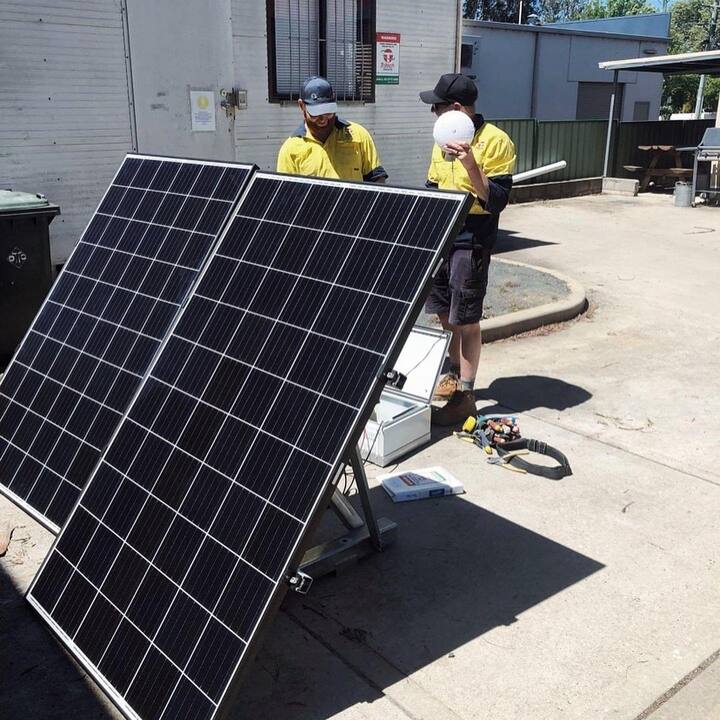 Two security workers discussing — Security Systems in Armidale, NSW