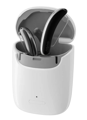 Hearing aids in a charging case. White case, open lid.