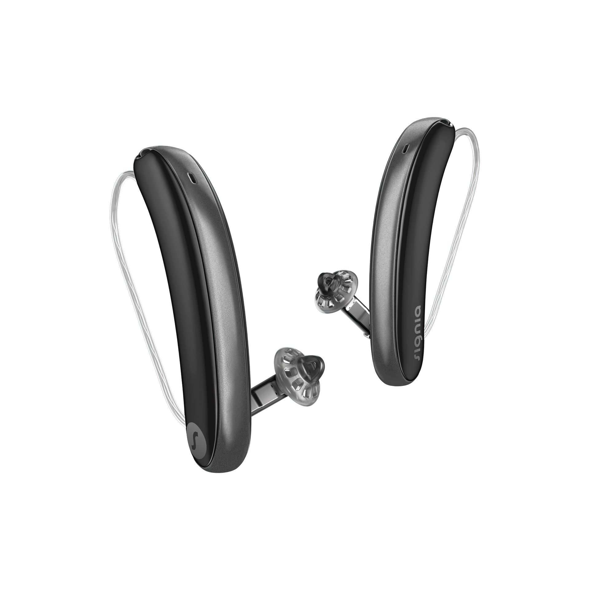 Pair of dark gray hearing aids, with clear ear tips and connecting wires.