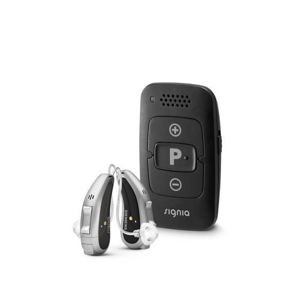 Signia hearing aids with a remote control, black and silver against a white background.