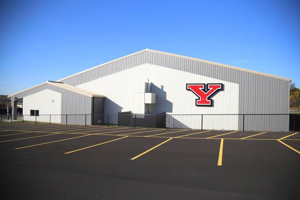 A large white building  YSU Tennis