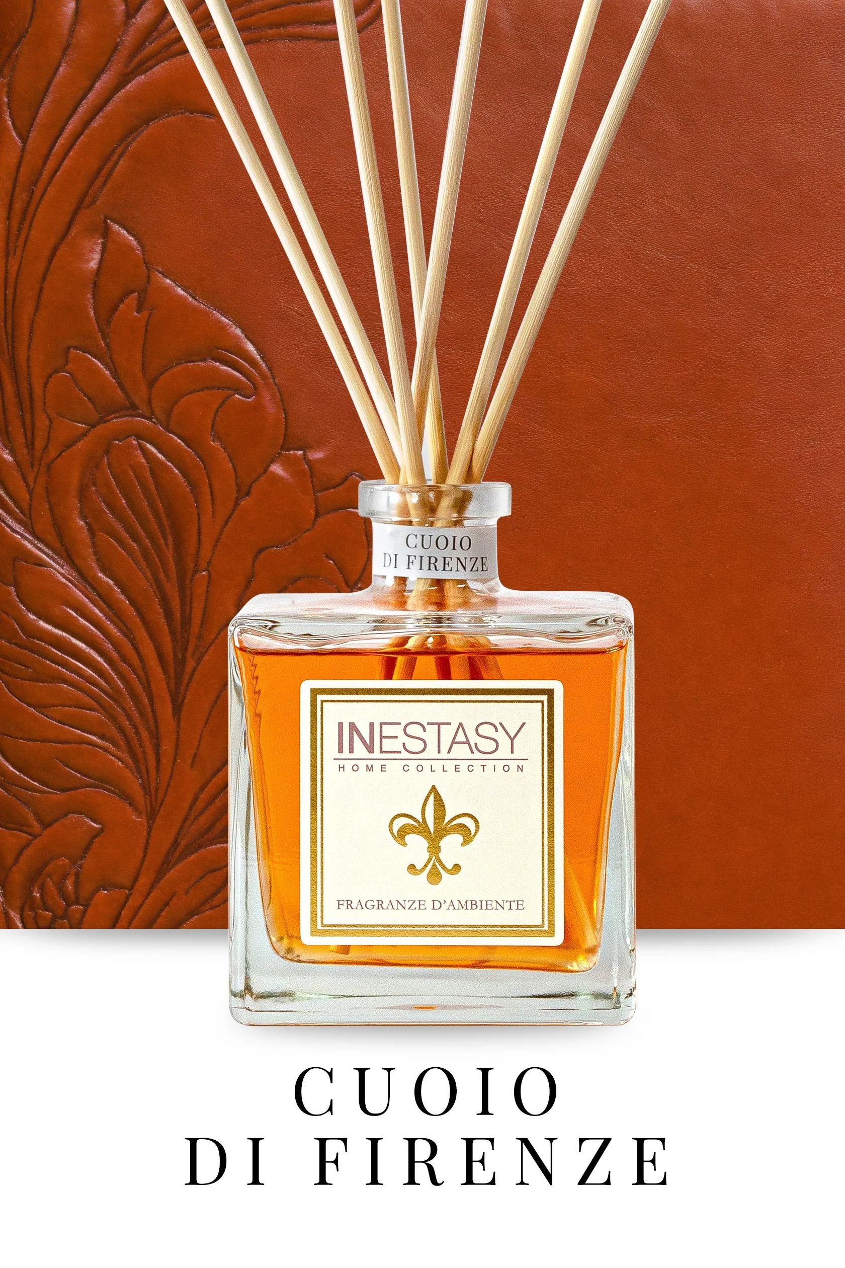 A bottle of cuoio di firenze perfume with wooden sticks