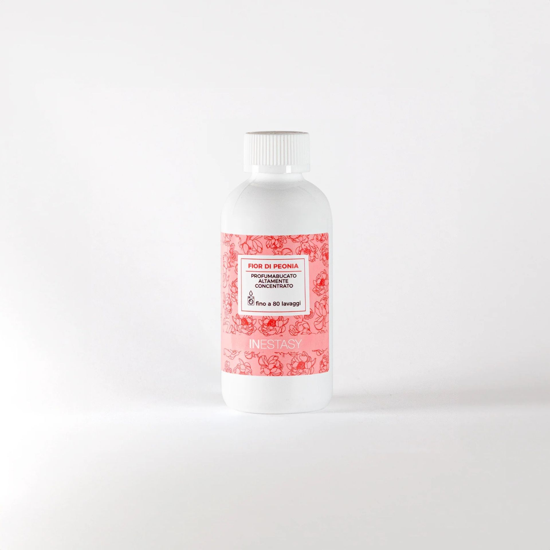 Una bottiglia bianca con un'etichetta rosa