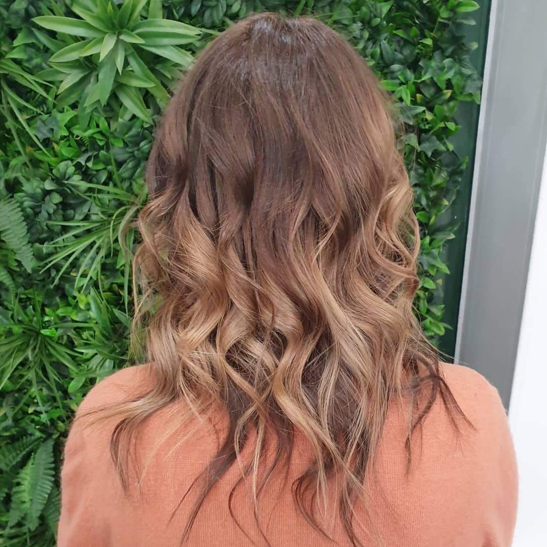 Woman With Brown Hair Styled in Loose Waves — ClaireAbella Hair Studio In Kariong, NSW