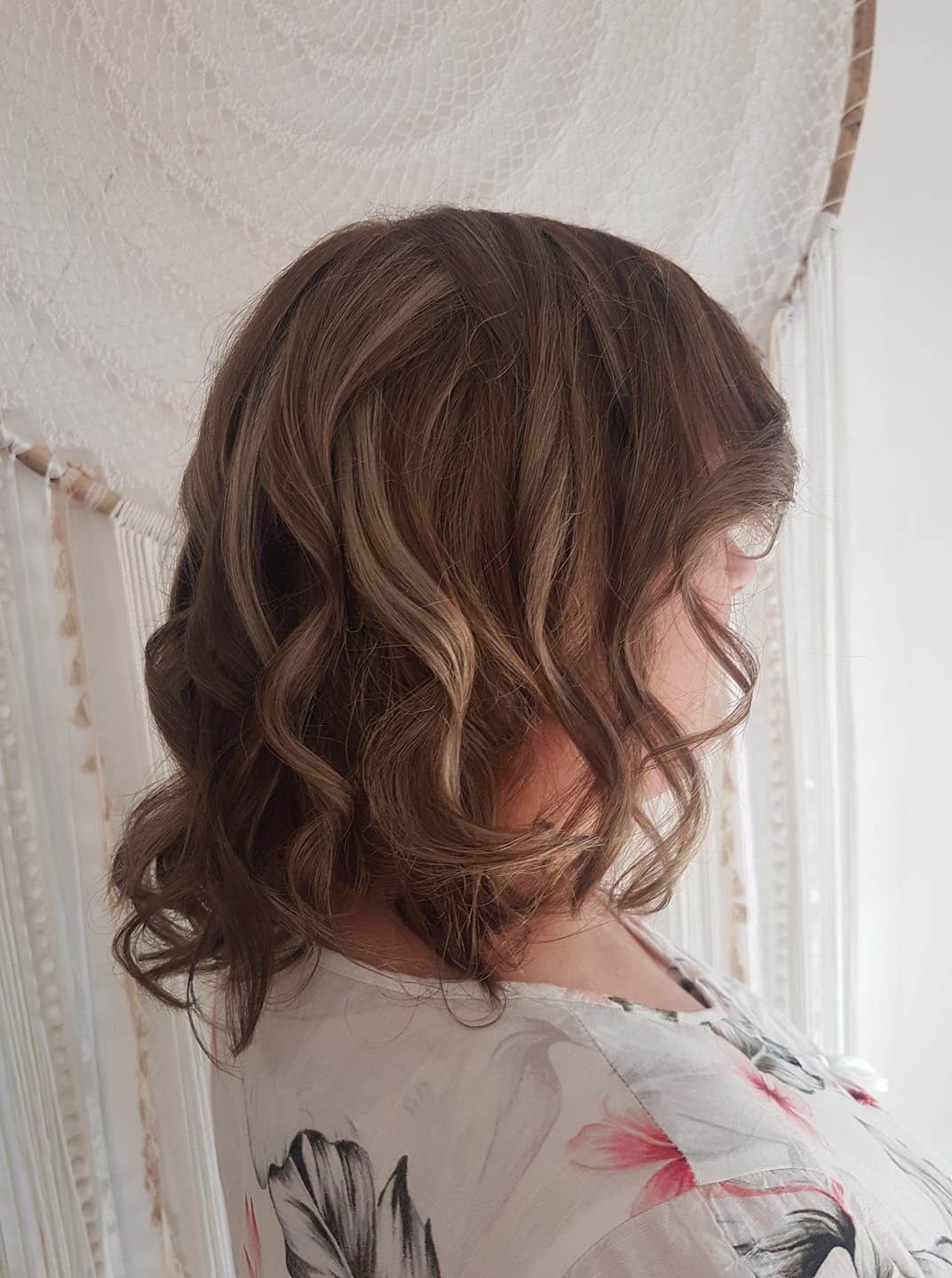 Woman With Wavy Brown Hair, Looking Right. Wearing Floral Print Top — ClaireAbella Hair Studio In Kariong, NSW