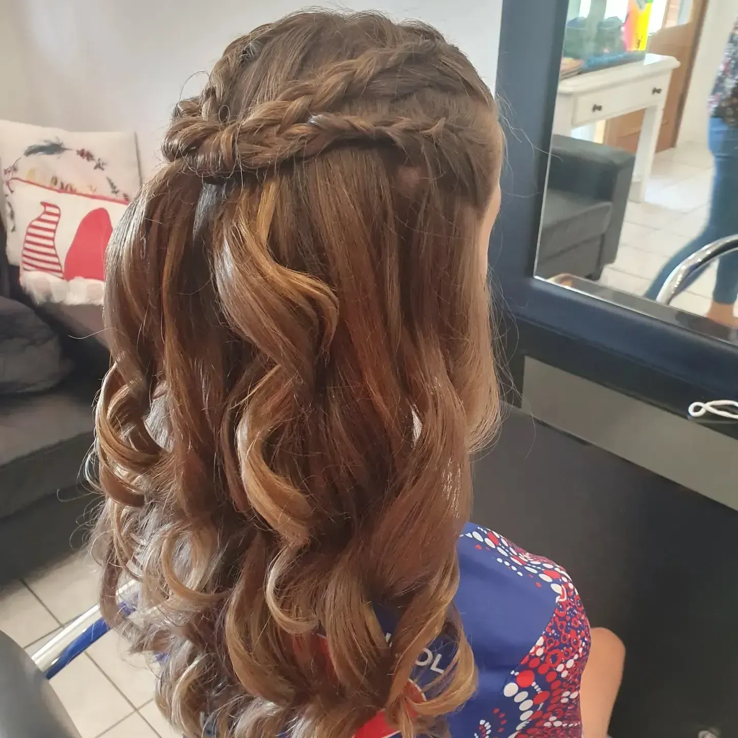 Hairstyle: Brown Hair With Side Braid and Curls. Sitting in a Salon Chair — ClaireAbella Hair Studio In Kariong, NSW