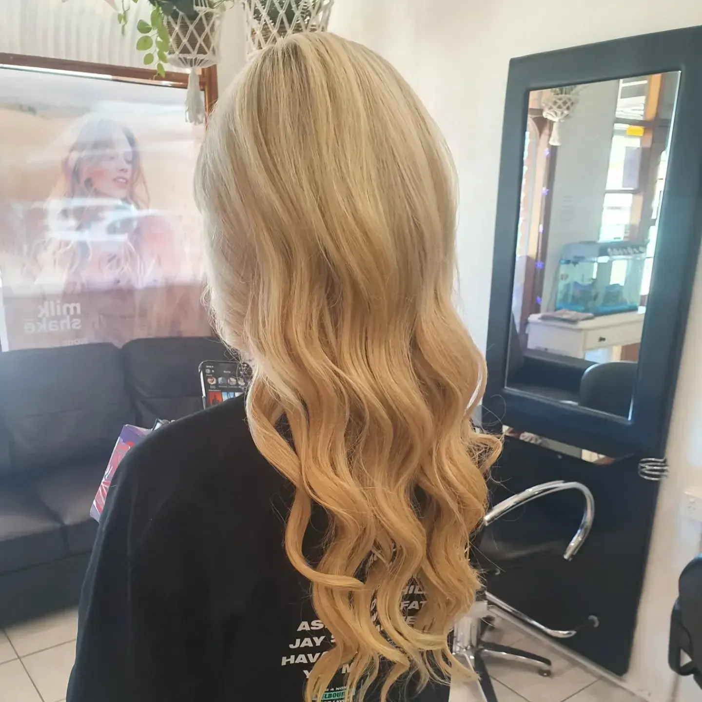 Blonde Hair With Long Waves, Styled in a Salon, Facing Away From the Camera — ClaireAbella Hair Studio In Kariong, NSW
