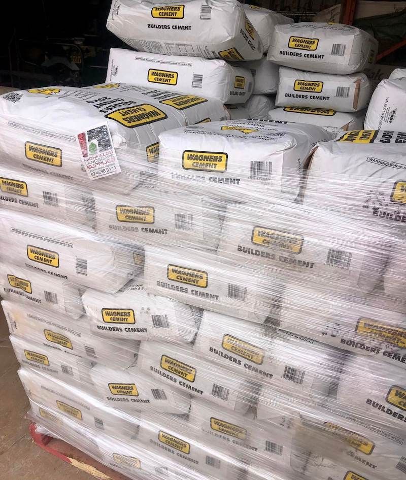 A Bunch of Bags of Cement Are Stacked on Top of Each Other — Highfields Landscape Supplies In Crows Nest, QLD