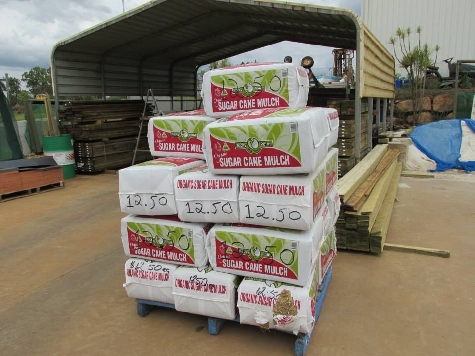 A Pallet of Sugar Cane Mulch is Stacked on Top of Each Other — Highfields Landscape Supplies In Meringandan, QLD