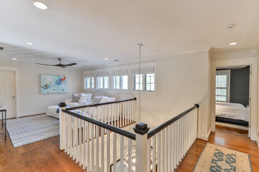 There is a staircase leading up to the second floor of a house.