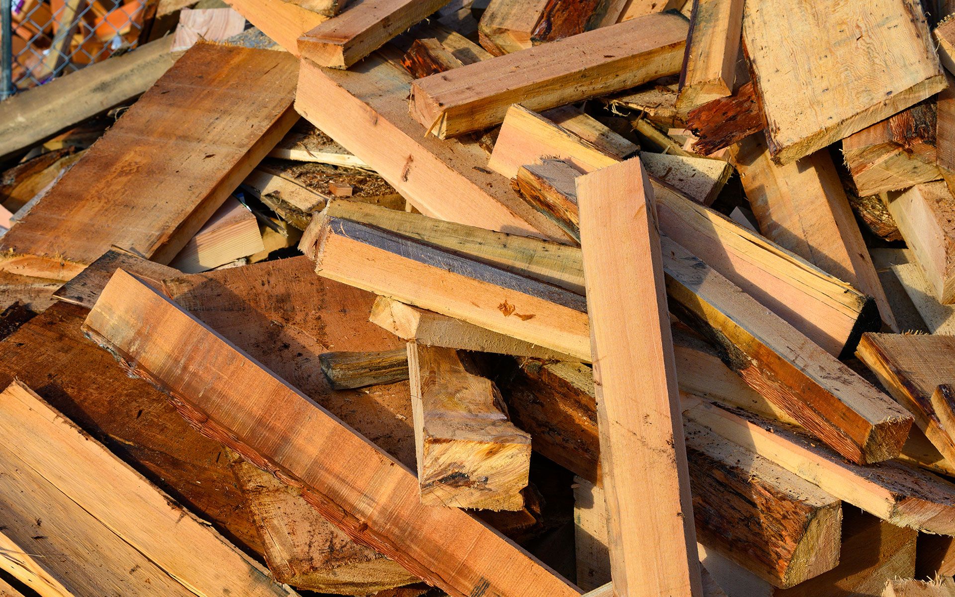 A pile of wood is stacked on top of each other