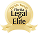 A gold florida legal elite badge with a ribbon around it.
