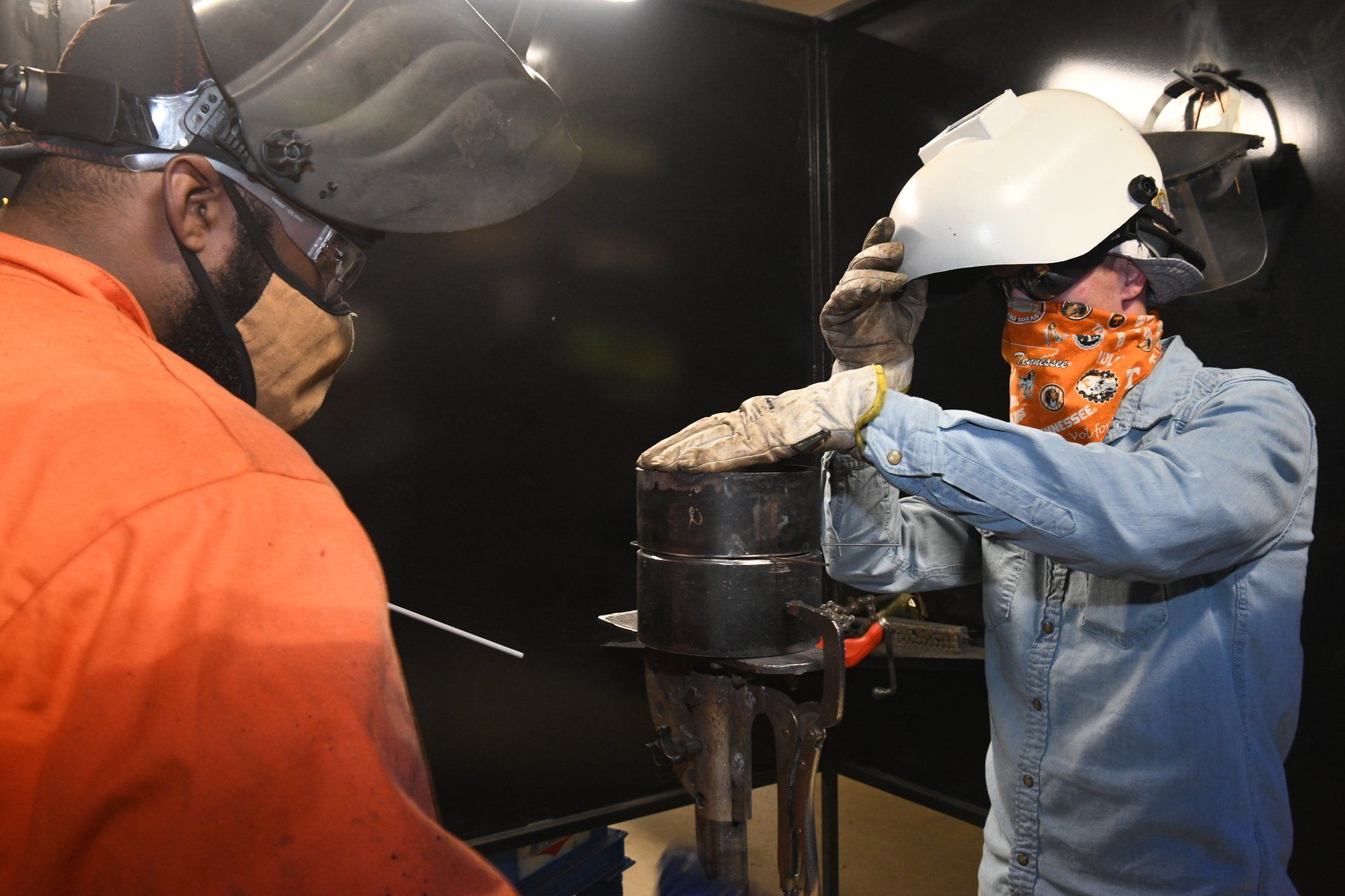 Local 538 Apprentices stick welding a pipe - 2-person job