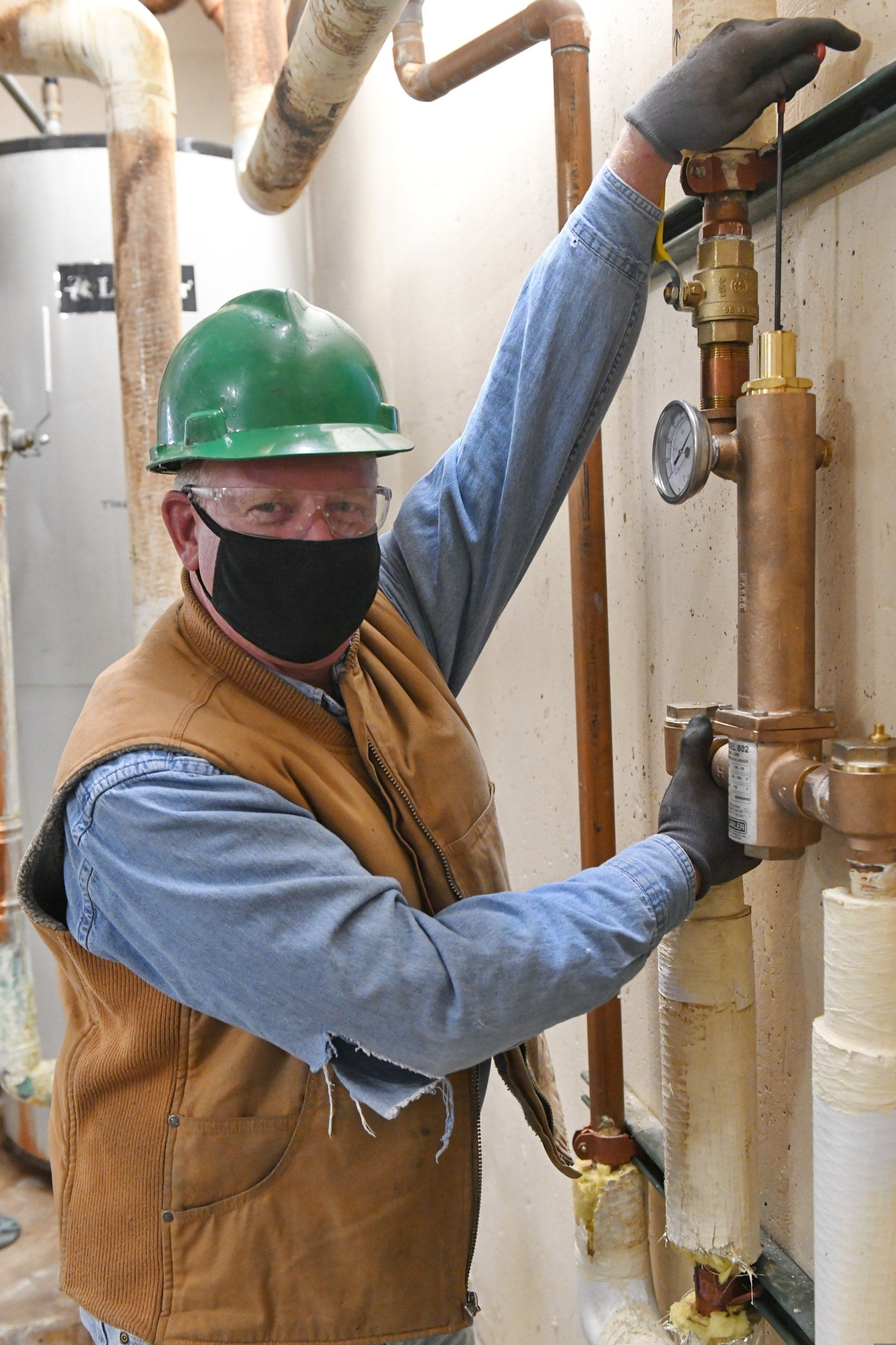 Local 5238 Mentor working on pipes that are intended to be within a wall