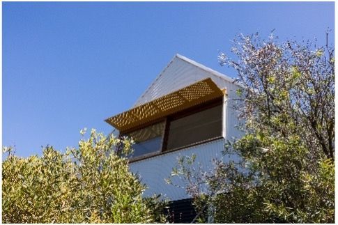 A white house with a roof that has a pergola on it. — Matt Loder Constructions in Corrimal, NSW