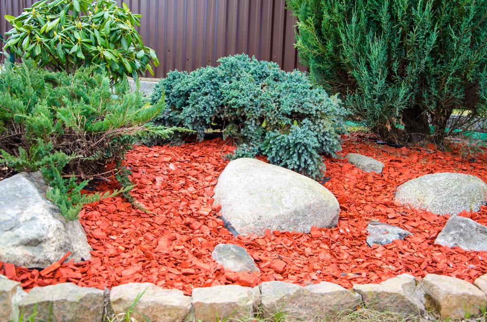 Red Mulch In Garden Bed — Landscape Supplies In Carrara, QLD