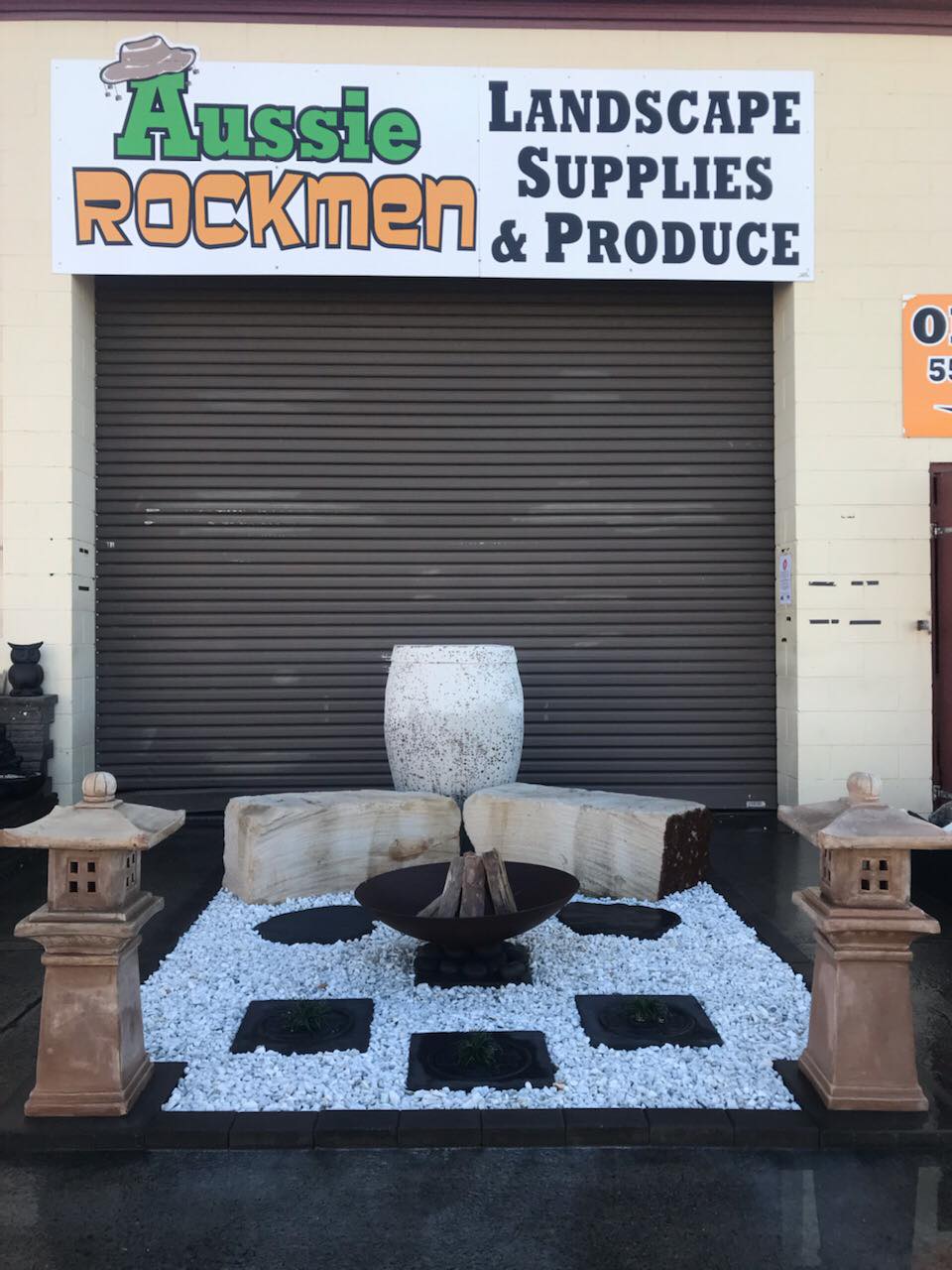 Fire Pit Display Outside Warehouse — Landscape Supplies In Carrara, QLD
