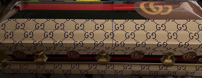 Gucci-branded casket with iconic 