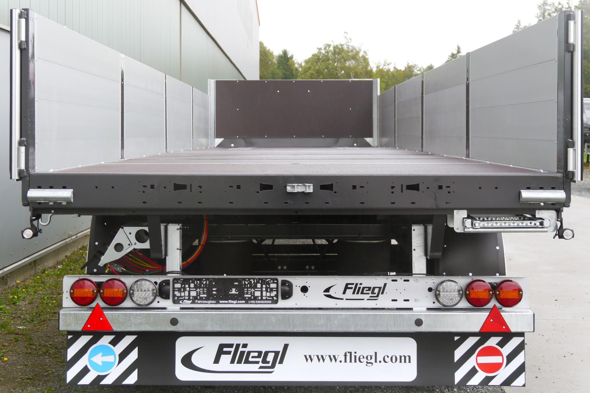 Fliegl bortinės puspriekabės