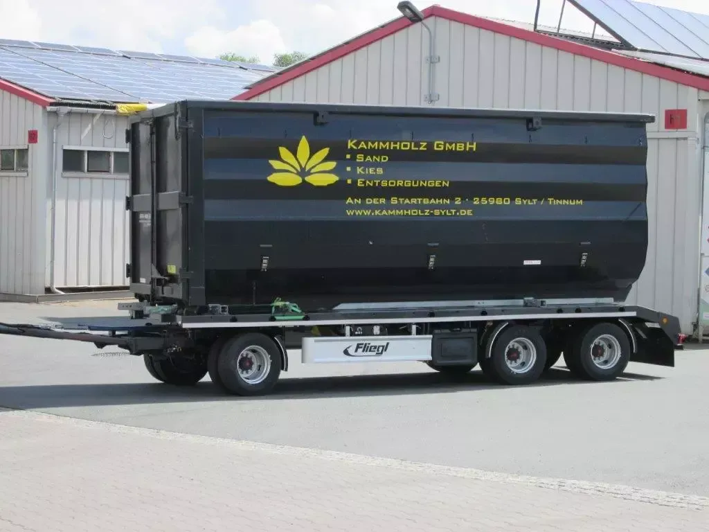 Konteinerių su ritinėliais transportavimas