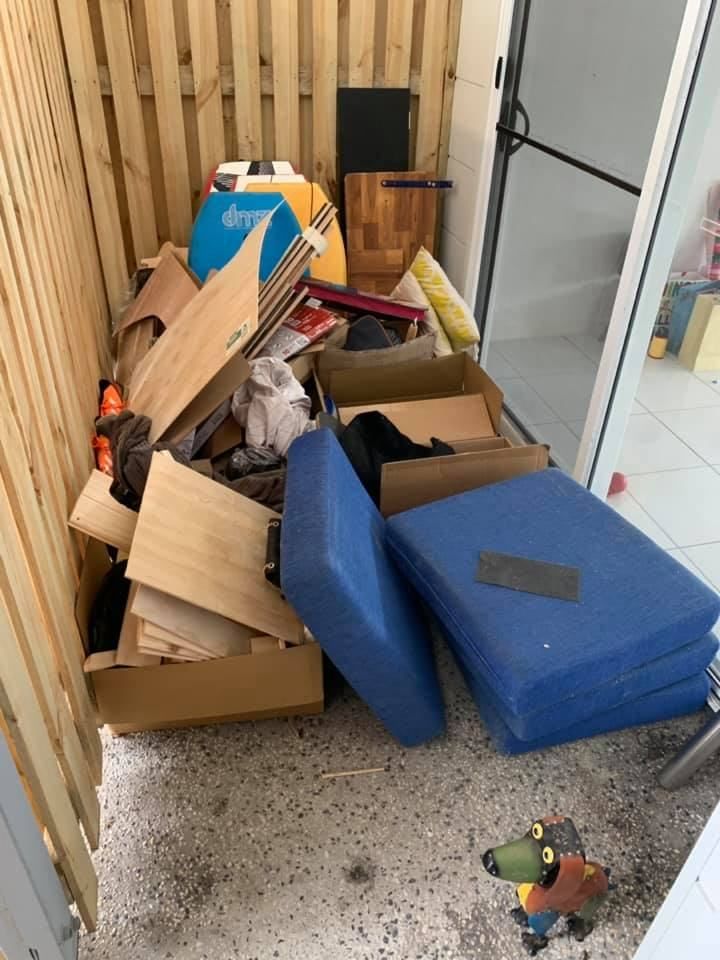 A Hose is Connected to a Refrigerator Outside of a House — A Load of Rubbish In Buderim, QLD