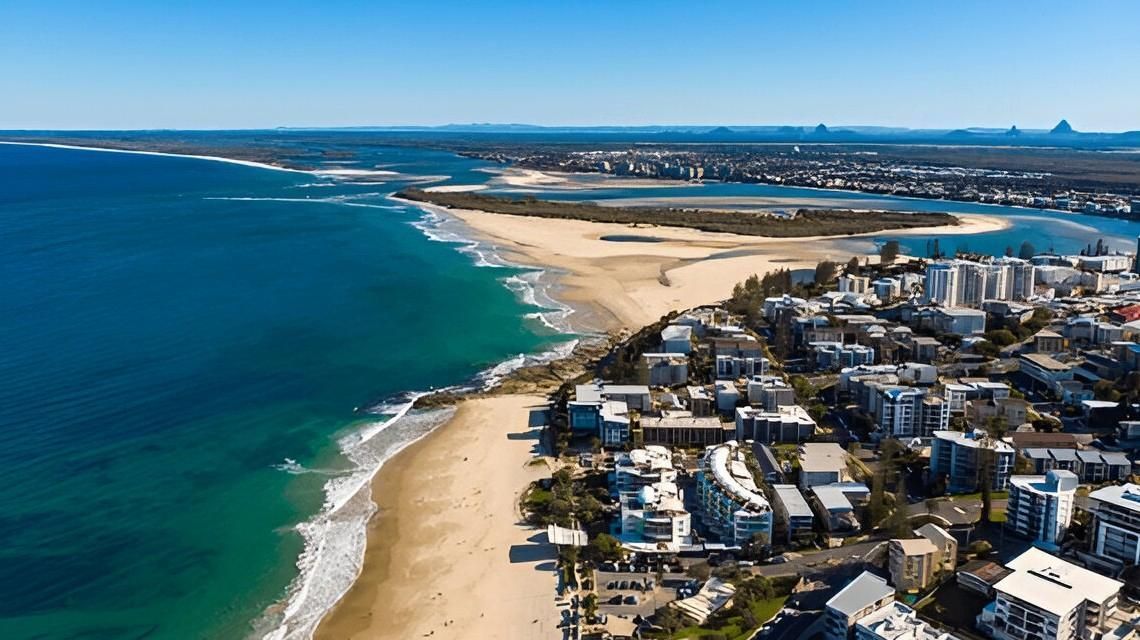 An Aerial View of a Beach With a City in the Background — A Load of Rubbish In Caloundra, QLD