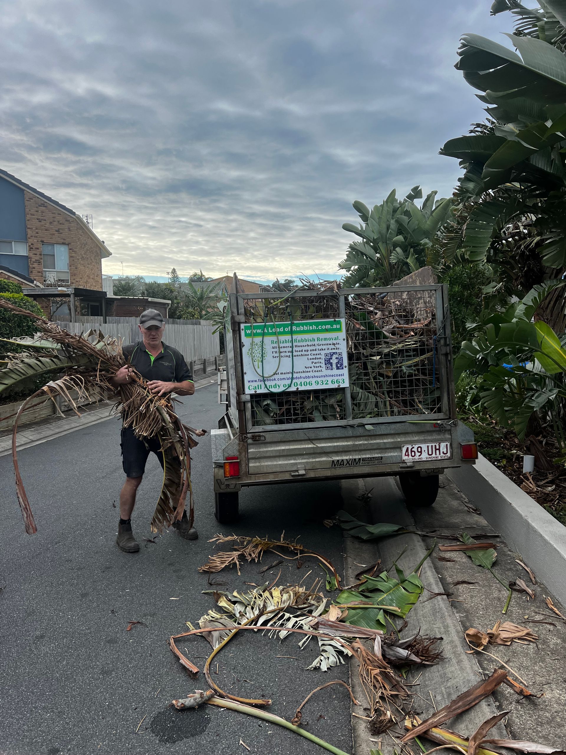 An Empty Room With a Window and a Yellow Carpet — A Load of Rubbish In Buderim, QLD