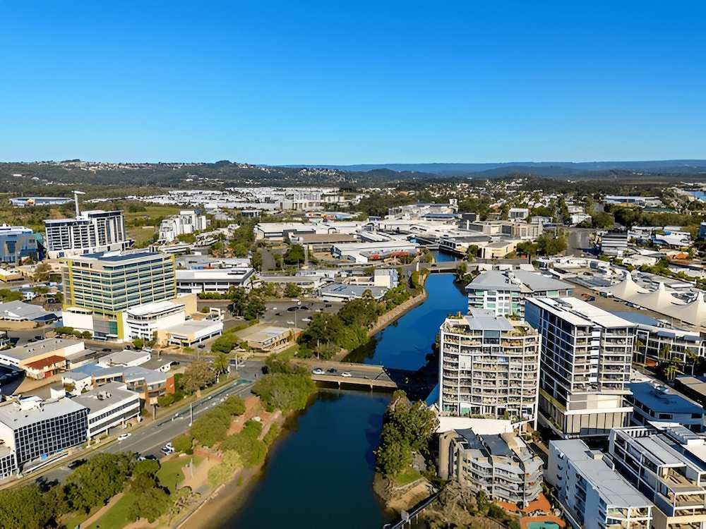 An Aerial View of a City With a River Running Through It — A Load of Rubbish In Maroochydore, QLD