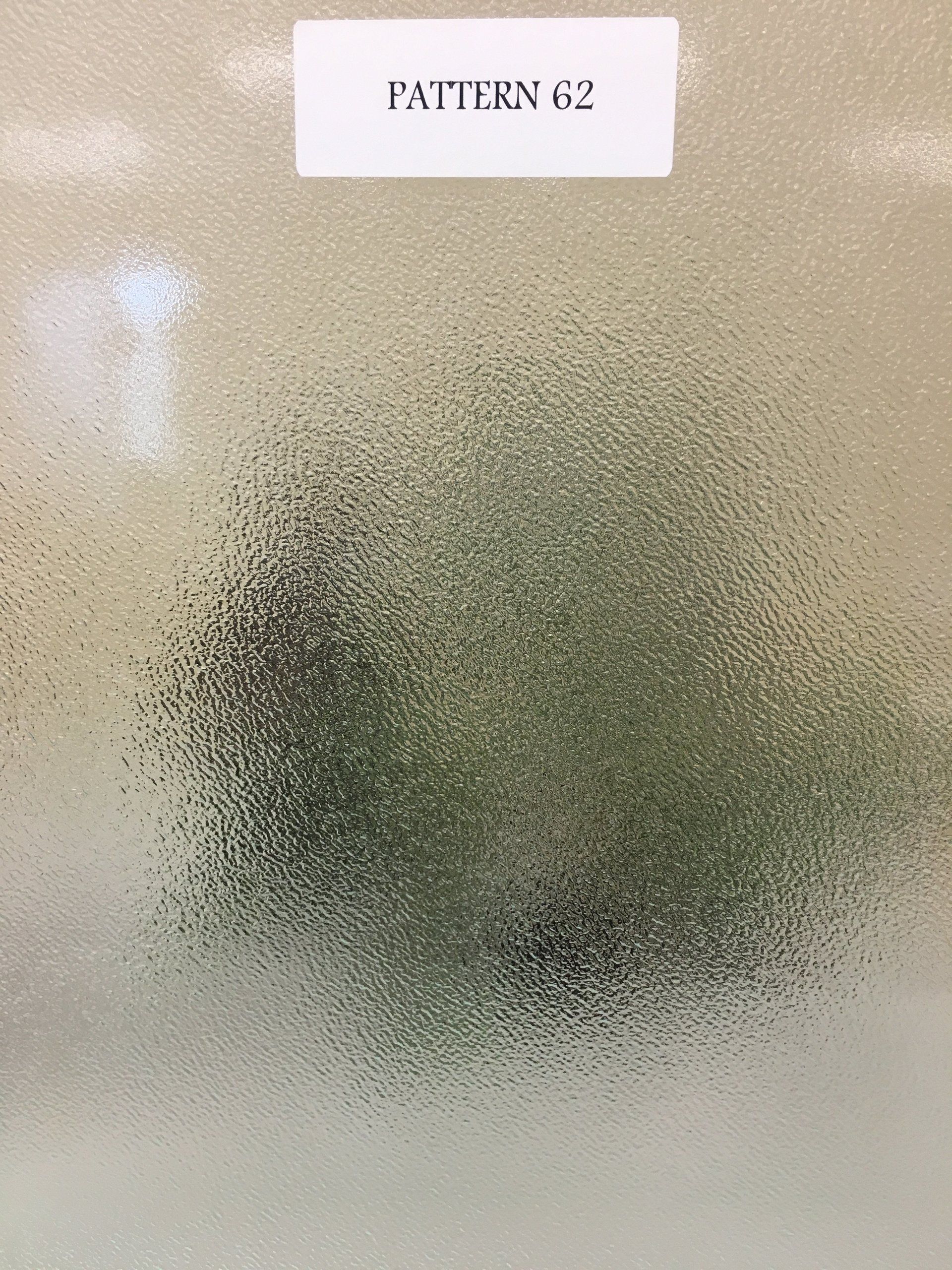 Frosted glass labeled 