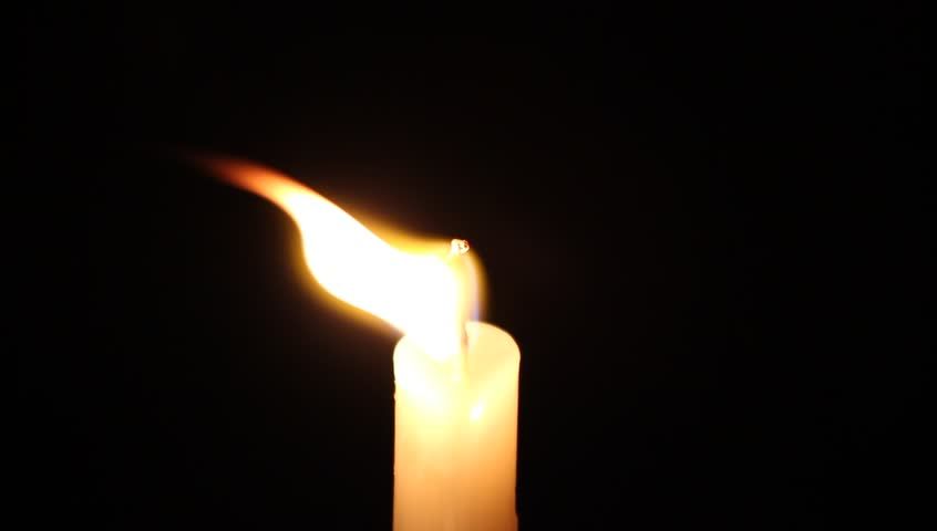 A Single Candle Is Lit up In the Dark — Alchemy Wellness Centre In Bangalow, NSW