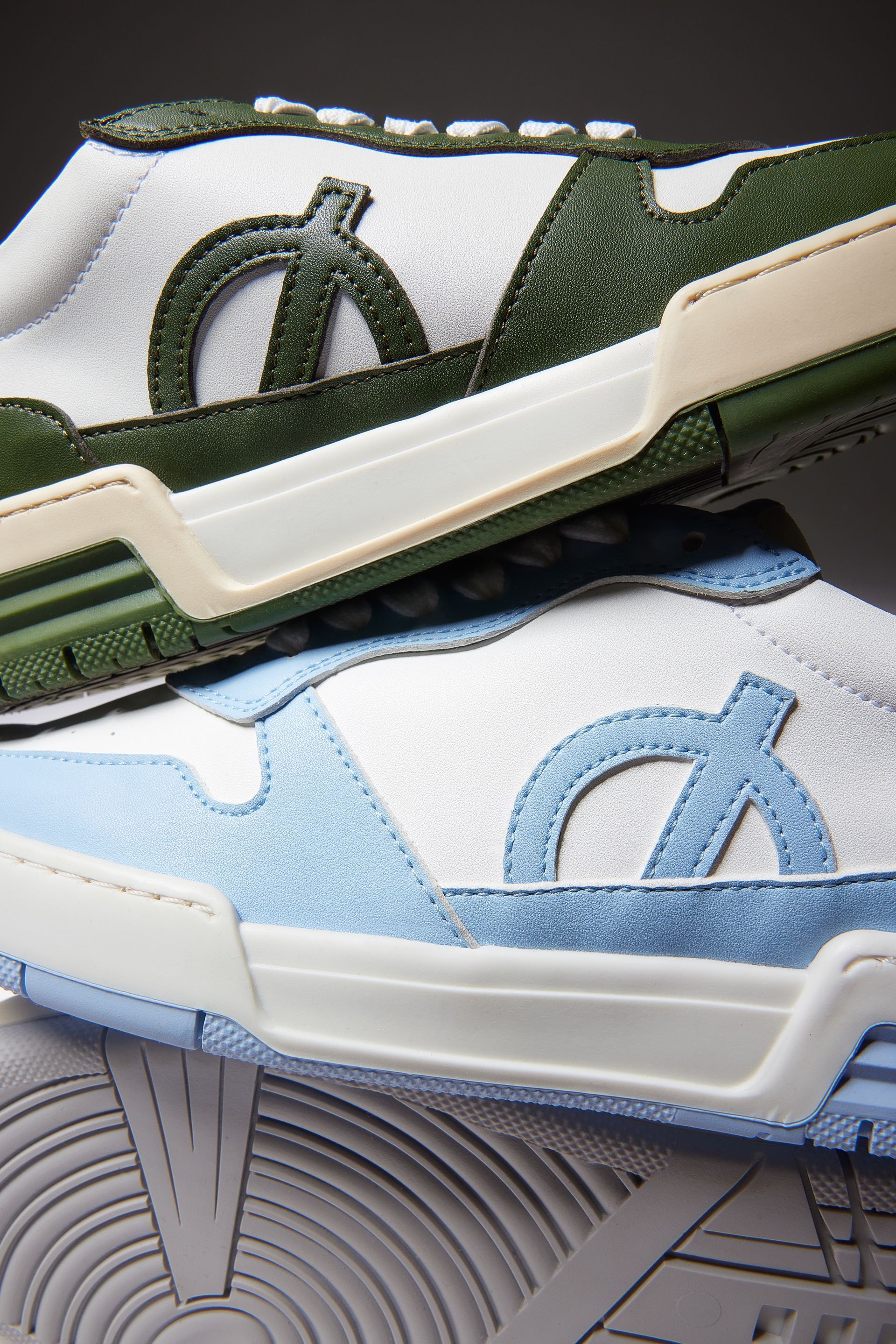 a pair of sneakers are stacked on top of each other