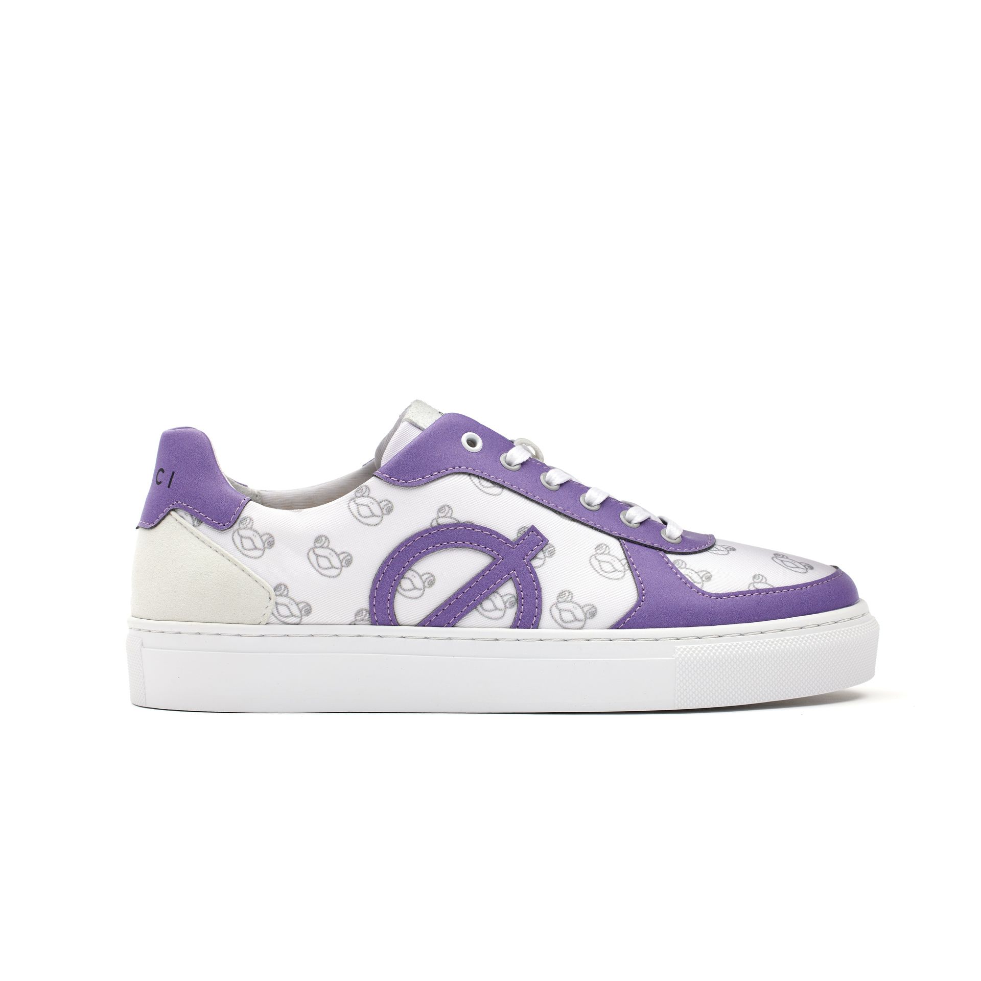 a pair of white and purple sneakers on a white background .