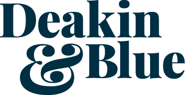 the deakin & blue logo is blue and white on a white background .