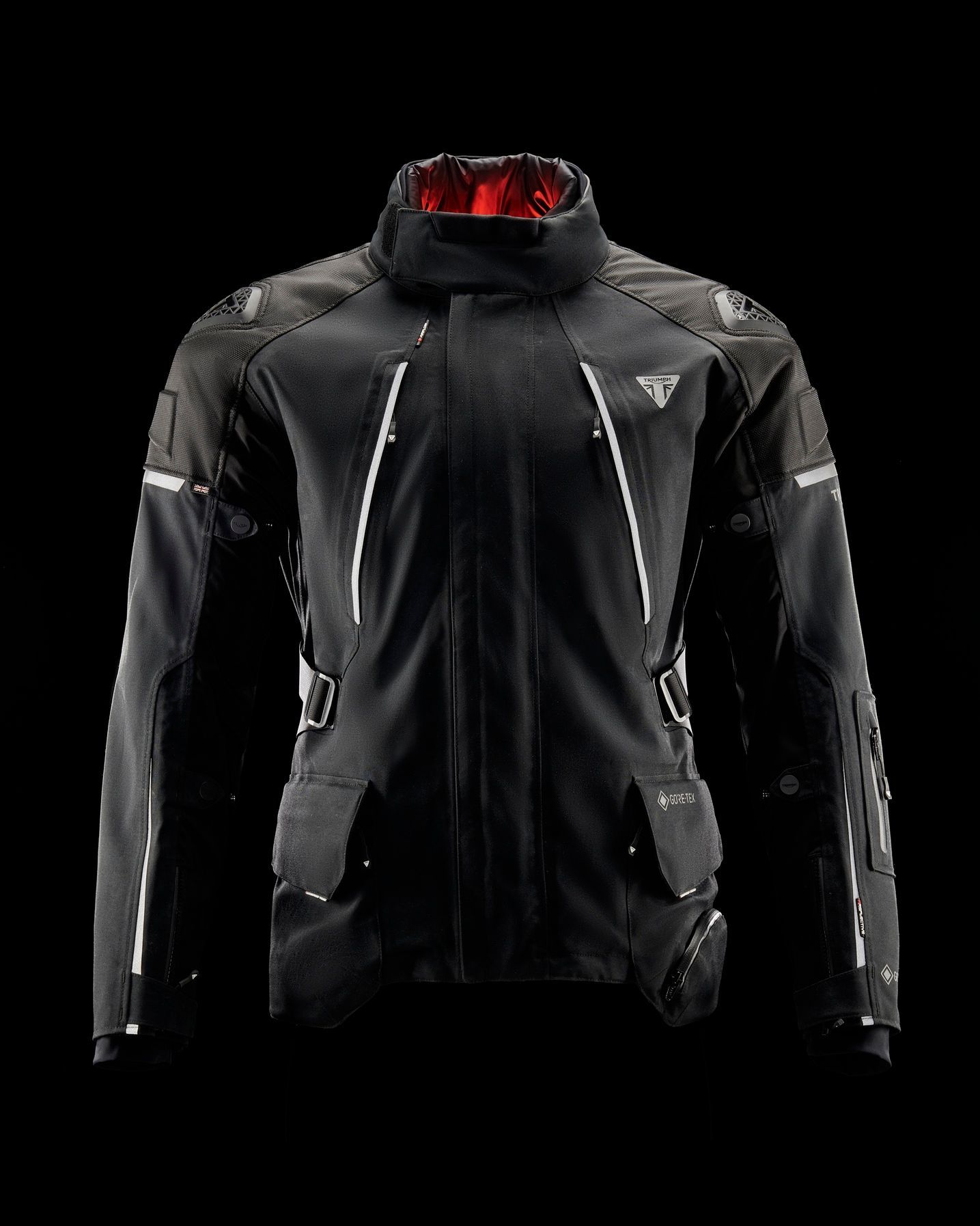 a black jacket with a red hood is on a black background