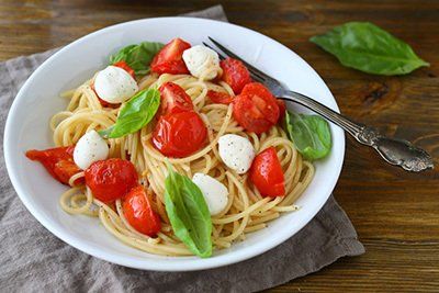 Italian pasta with tomatoes and cheese - San Vito Restaurant in Bayonne NJ
