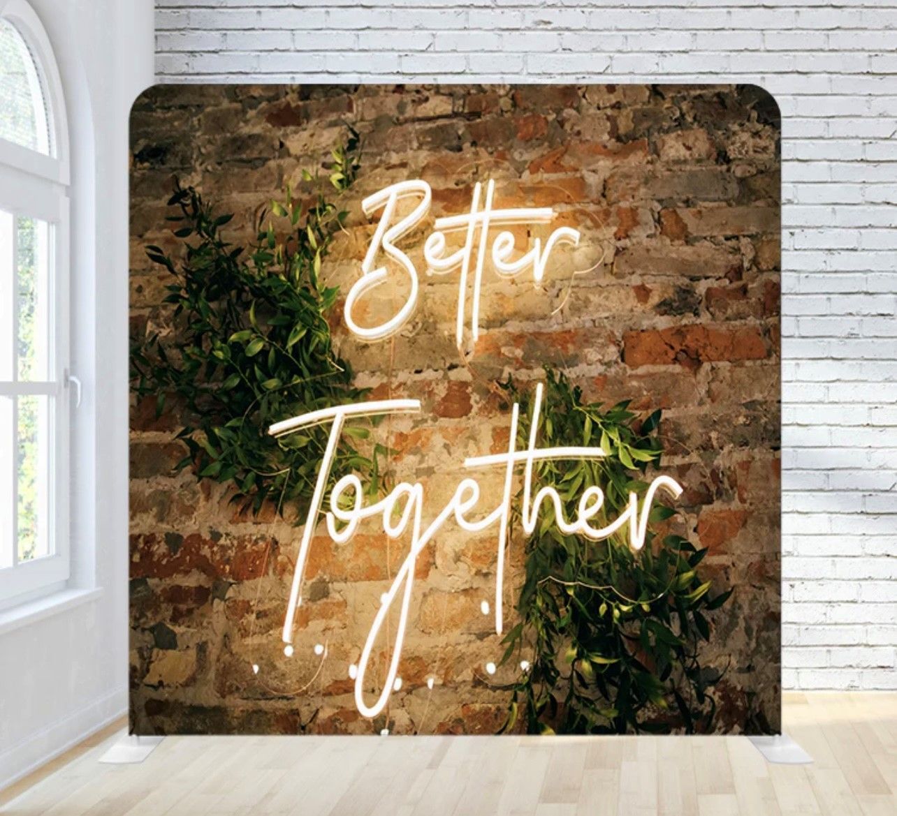 A brick wall with a neon sign that says better together