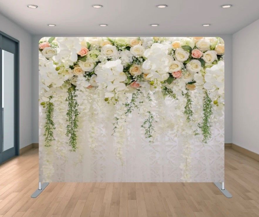 A room with a wall with white flowers on it