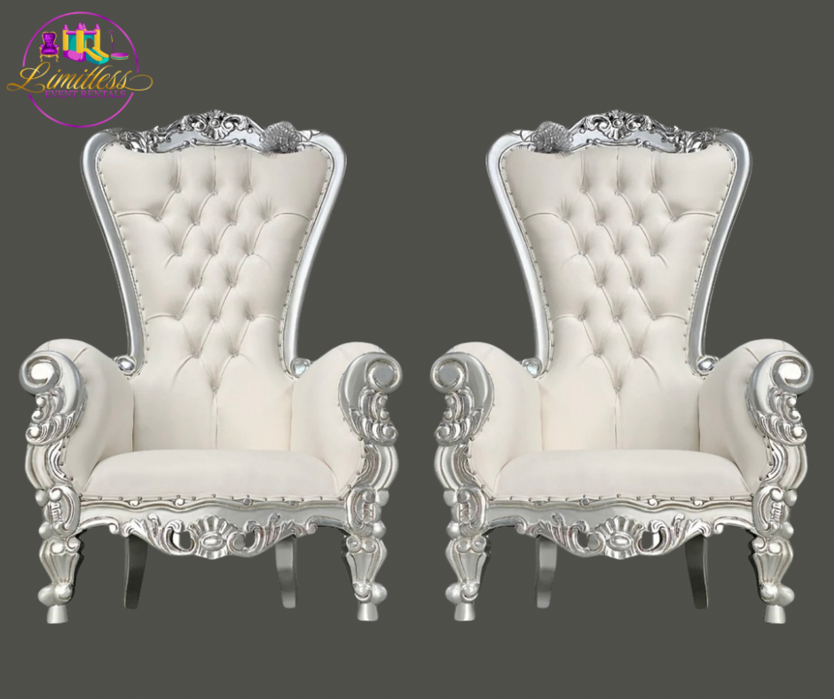 A pair of white and silver chairs on a gray background.